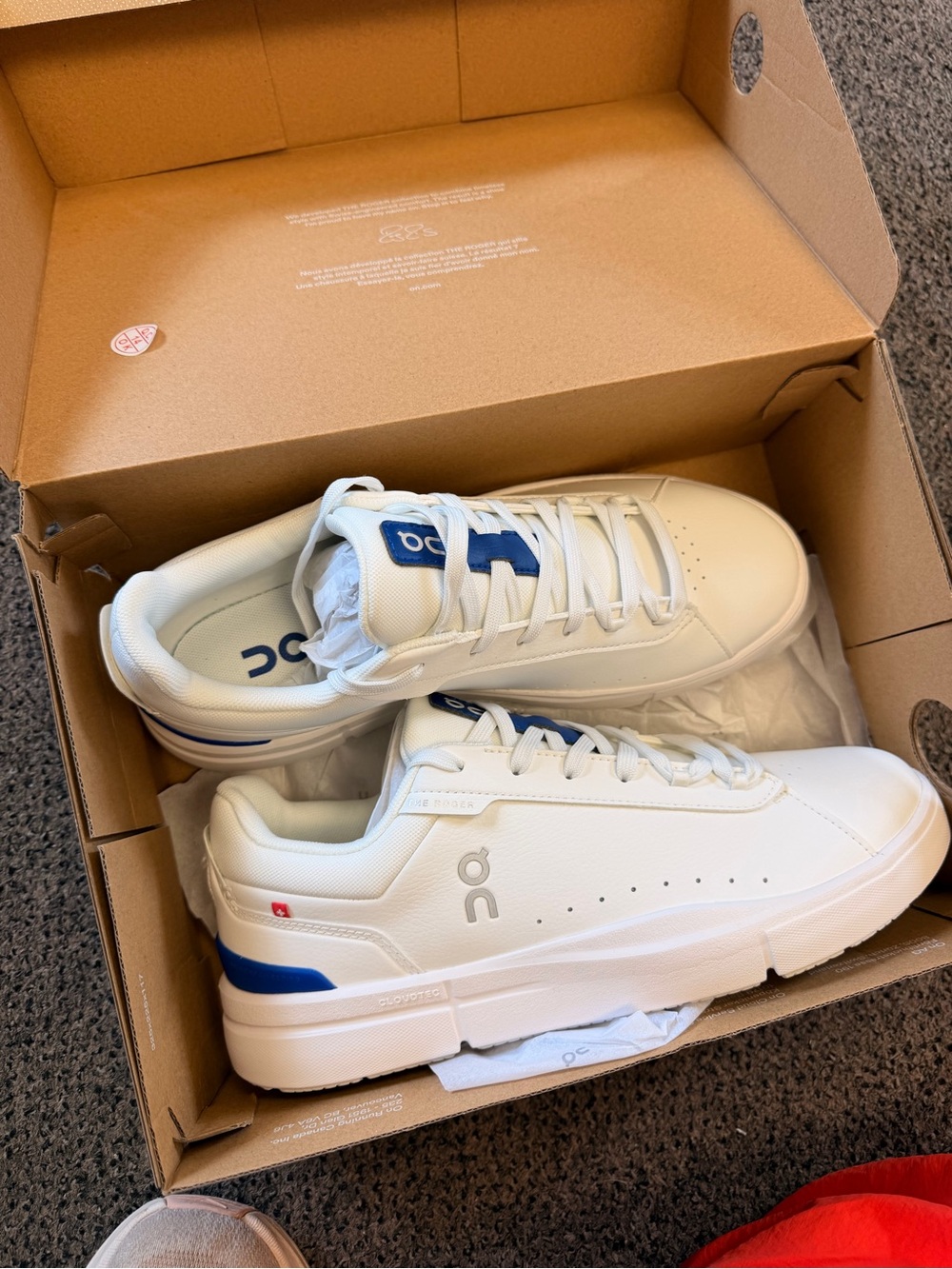 On Cloud Roger White Sneakers with Blue Accents